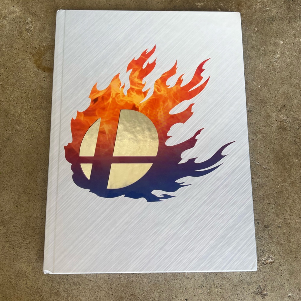 Super Smash Bros. Ultimate Gaming Guide - White Cover with Multicolor Design